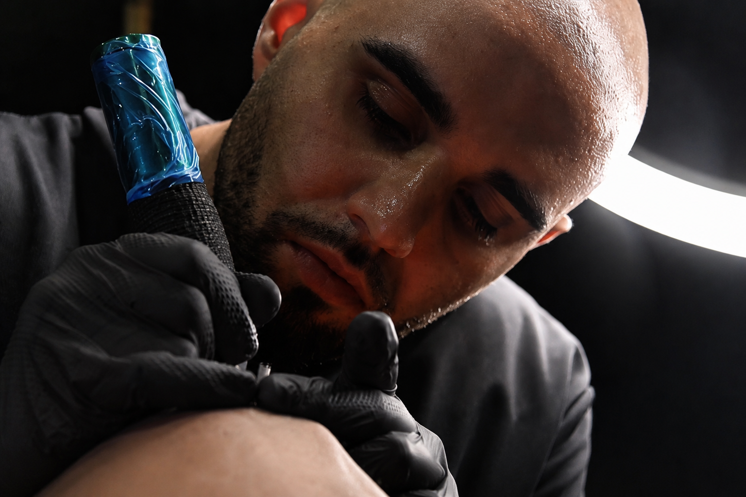 Charlie performing scalp micropigmentation